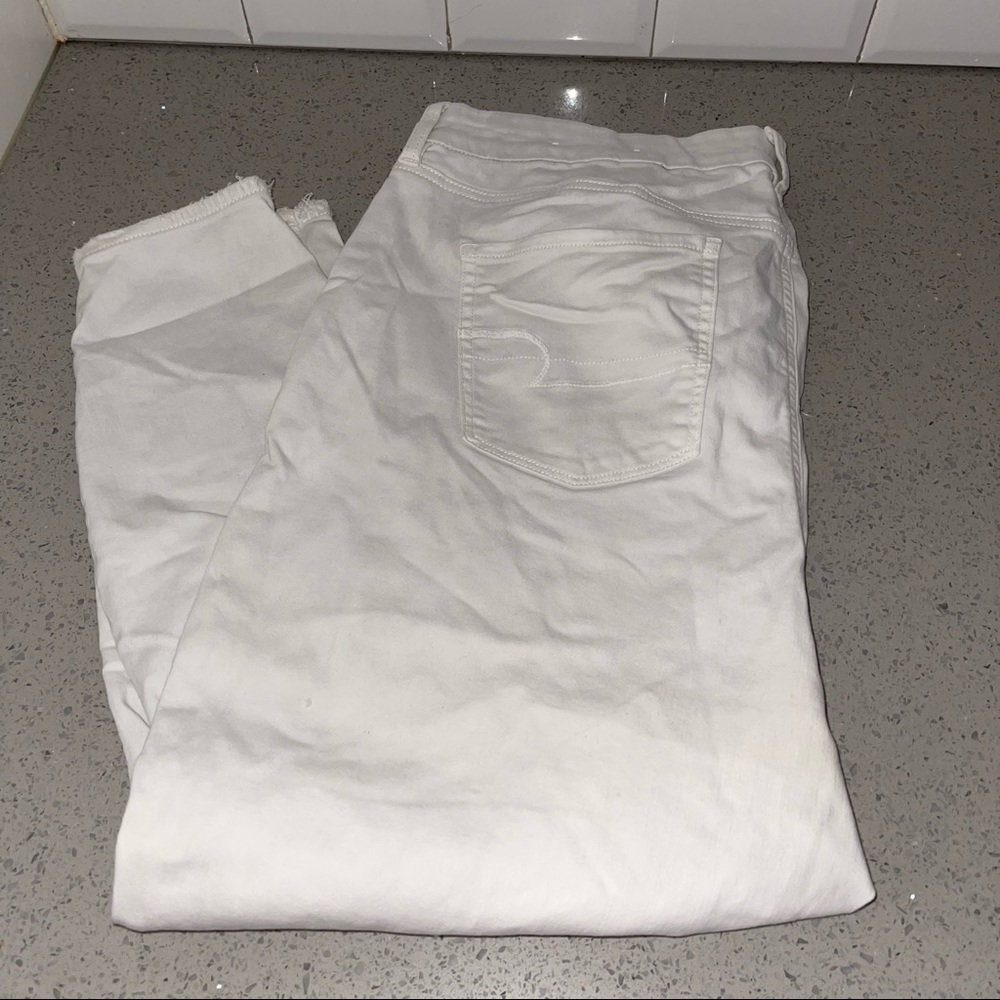 American Eagle white jeans.